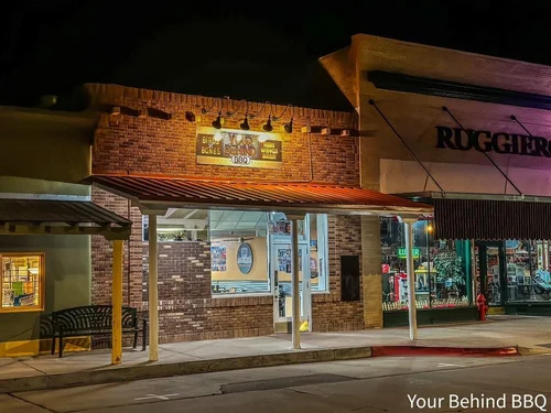 Your Behind BBQ storefront at night